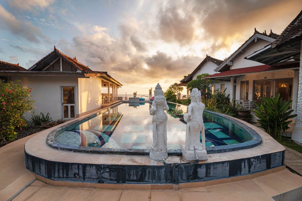 Swimming pool at SALT Bali in Amed at sunset