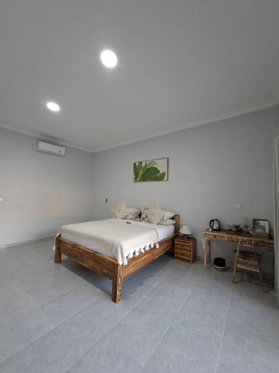 Garden Room bedroom wide view at Little SALT