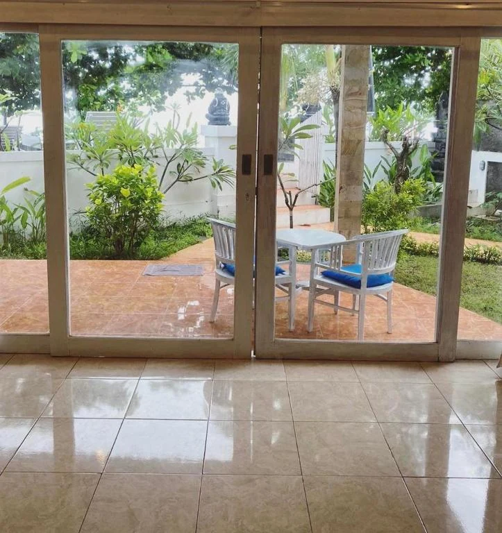Budget beachfront terrace from room at Little SALT